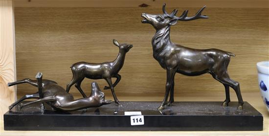 An Art Deco bronze group of a stag and two deer length 62cm (a.f.)